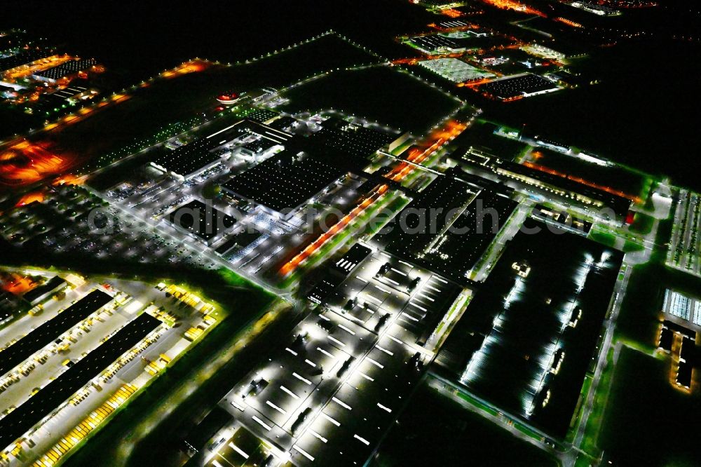 Leipzig at night from above - Night lighting Building and production halls on the premises of Dr. Ing. h.c. F. Porsche AG on Porschestrasse in Leipzig in the state Saxony, Germany