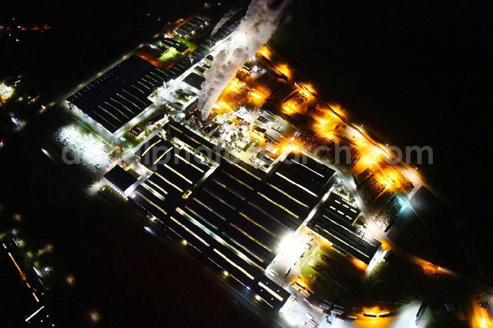 Heiligengrabe at night from above - Night lighting building and production halls on the premises of KRONOTEX GmbH in Heiligengrabe in the state Brandenburg, Germany