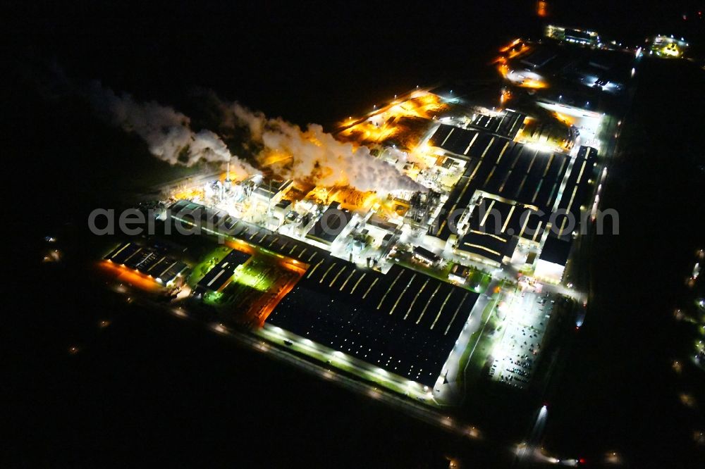 Heiligengrabe at night from above - Night lighting building and production halls on the premises of KRONOTEX GmbH in Heiligengrabe in the state Brandenburg, Germany