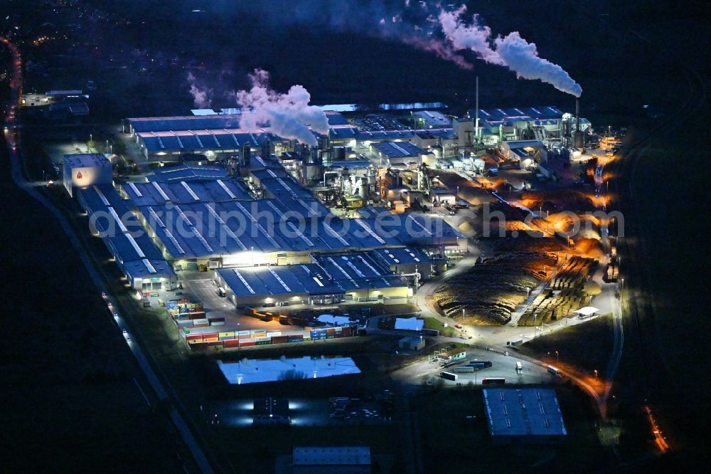 Aerial image at night Heiligengrabe - Night lighting building and production halls on the premises of KRONOTEX GmbH in Heiligengrabe in the state Brandenburg, Germany