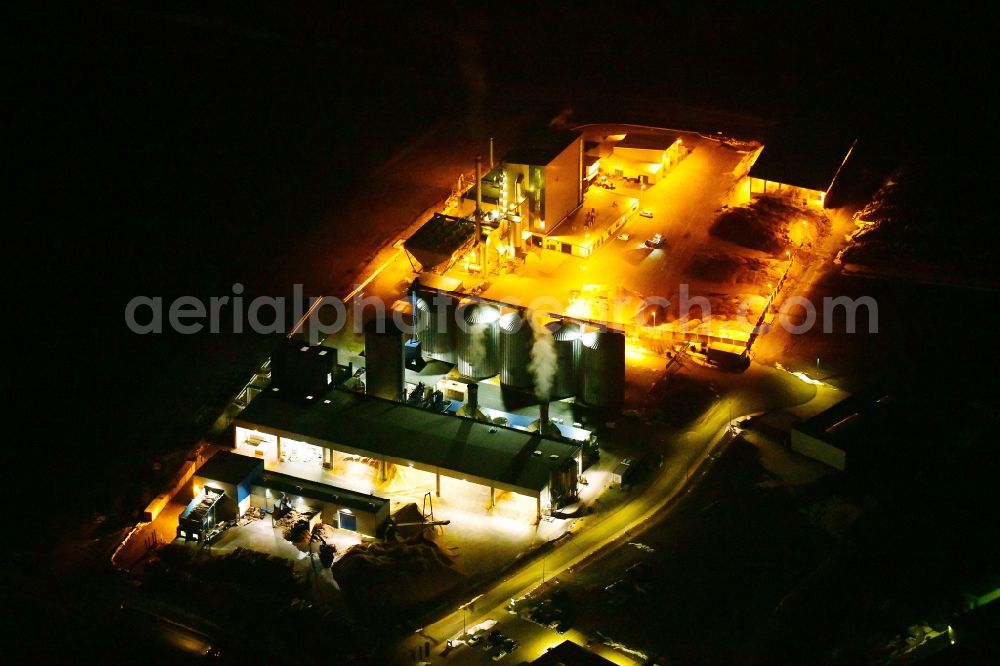 Aerial image at night Erndtebrück - Night lighting building and production halls on the premises of NRW Pellets GmbH in Erndtebrueck in the state North Rhine-Westphalia, Germany