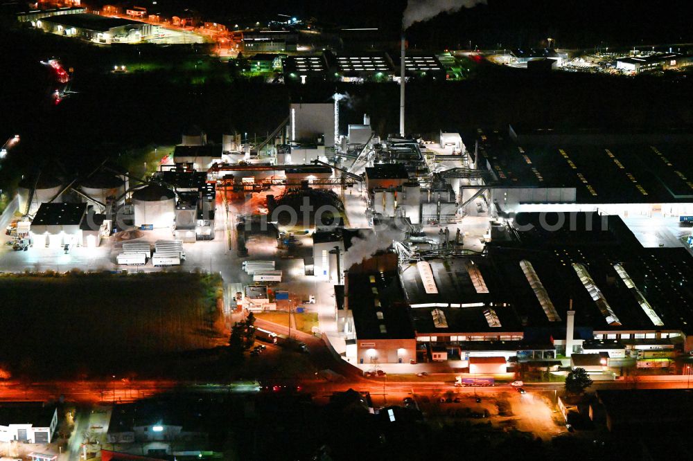 Neumarkt in der Oberpfalz at night from above - Night lighting building and production halls on the premises of Pfleiofer Neumarkt GmbH on Dreichlingerstrasse in Neumarkt in der Oberpfalz in the state Bavaria, Germany