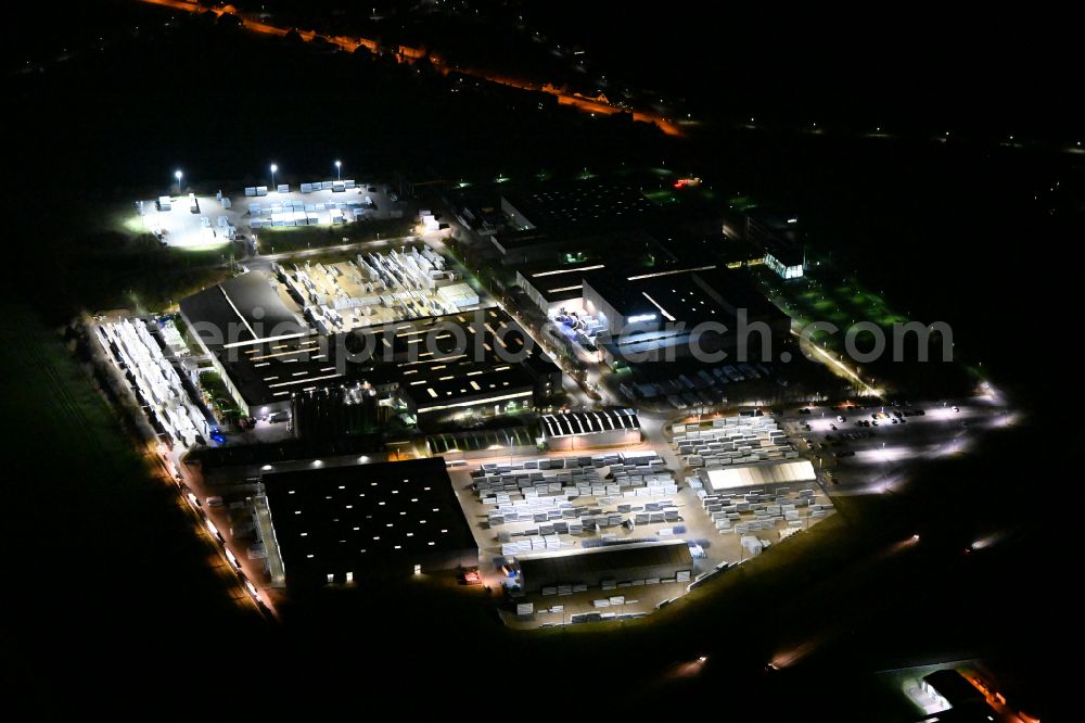 Weißenfels at night from above - Night lighting building and production halls on the premises of Schueco Polymer Technologies KG on street Selauer Strasse in the district Borau in Weissenfels in the state Saxony-Anhalt, Germany