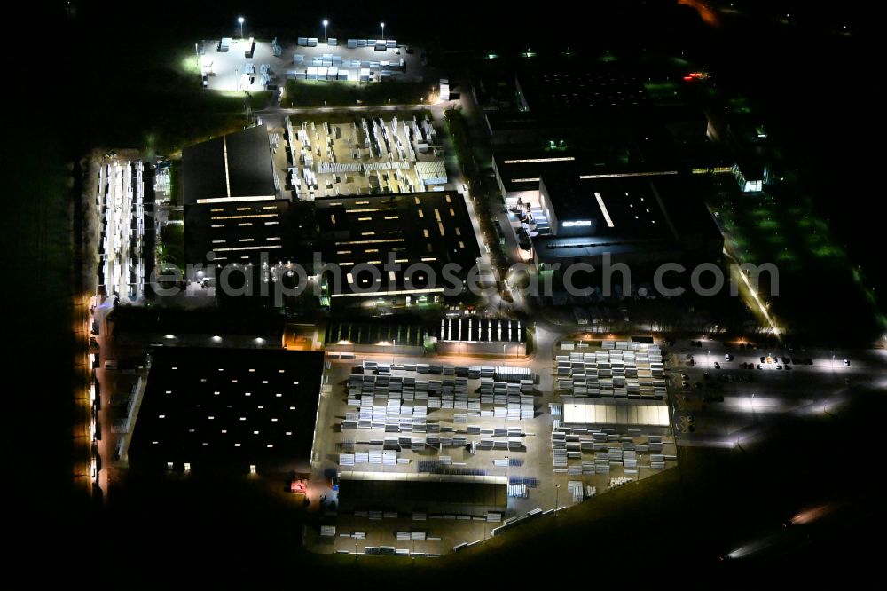 Aerial image at night Weißenfels - Night lighting building and production halls on the premises of Schueco Polymer Technologies KG on street Selauer Strasse in the district Borau in Weissenfels in the state Saxony-Anhalt, Germany