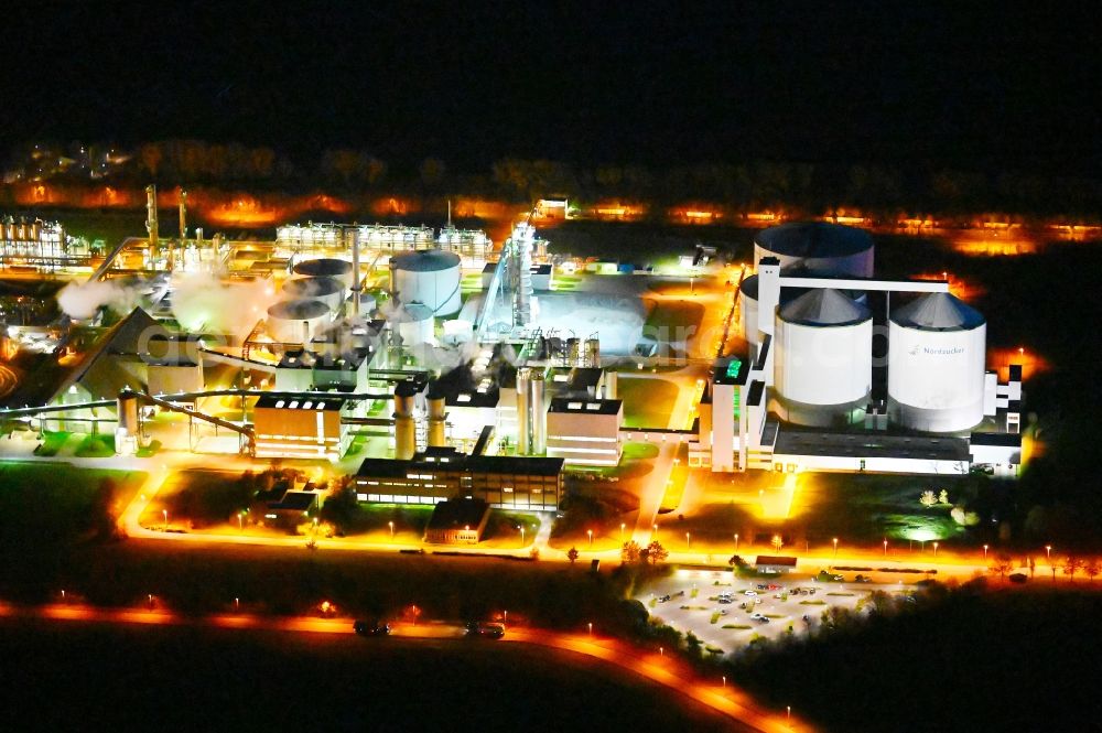 Klein Wanzleben at night from above - Night lighting building and production halls on the premises the sugar factory in Klein Wanzleben in the state Saxony-Anhalt, Germany