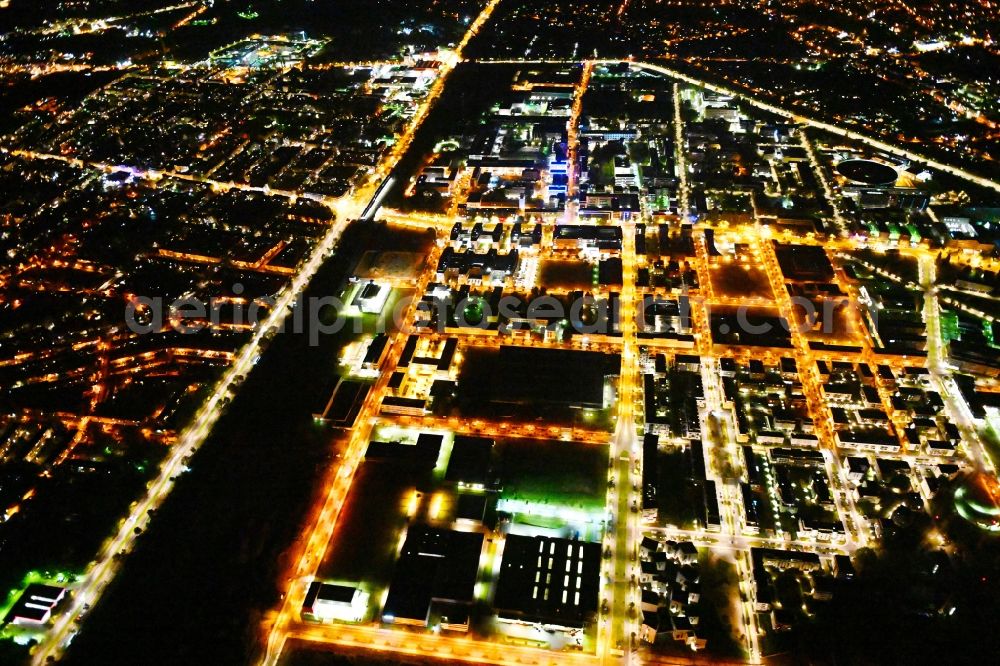 Berlin at night from the bird perspective: Night lighting industrial estate and company settlement - WISTA in the district Adlershof in Berlin, Germany