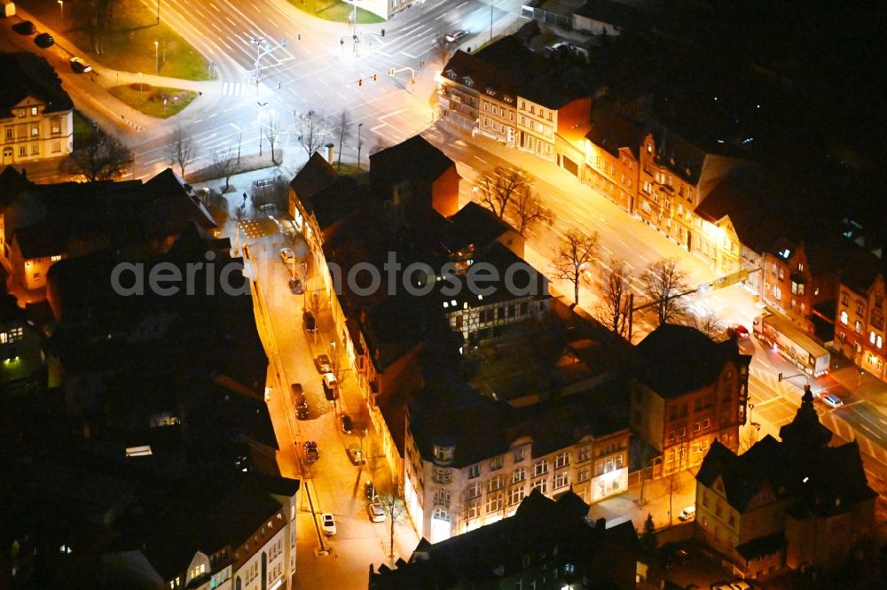 Mühlhausen at night from above - Night lighting residential area of the multi-family house settlement Goermarstrasse - Kiliansgraben - Unter der Linde in the district Altstadt in Muehlhausen in the state Thuringia, Germany