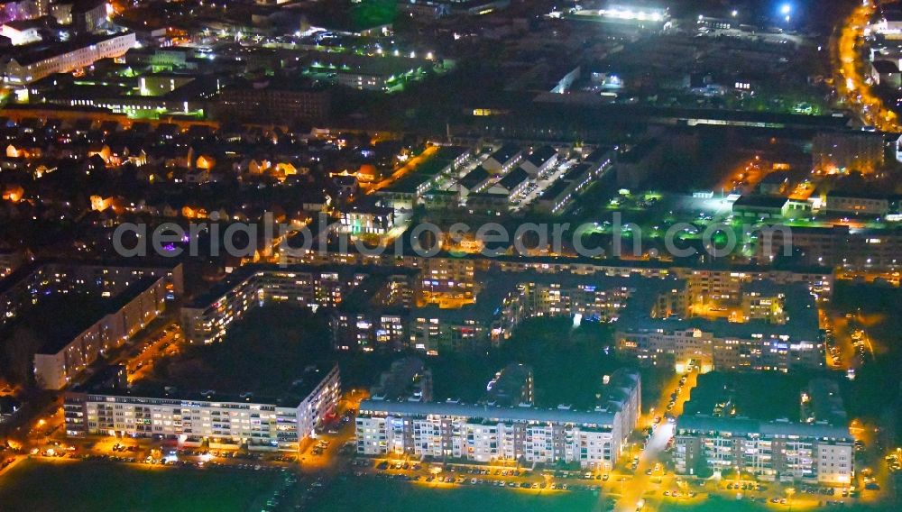 Berlin at night from above - Night lighting residential area of a multi-family house settlement Plauener Strasse - Sollstaedter Strasse - Arendsweg in the district Hohenschoenhausen in Berlin, Germany