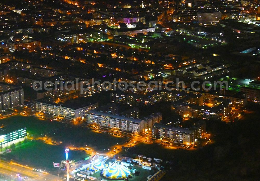 Aerial image at night Berlin - Night lighting residential area of a multi-family house settlement Plauener Strasse - Sollstaedter Strasse - Arendsweg in the district Hohenschoenhausen in Berlin, Germany