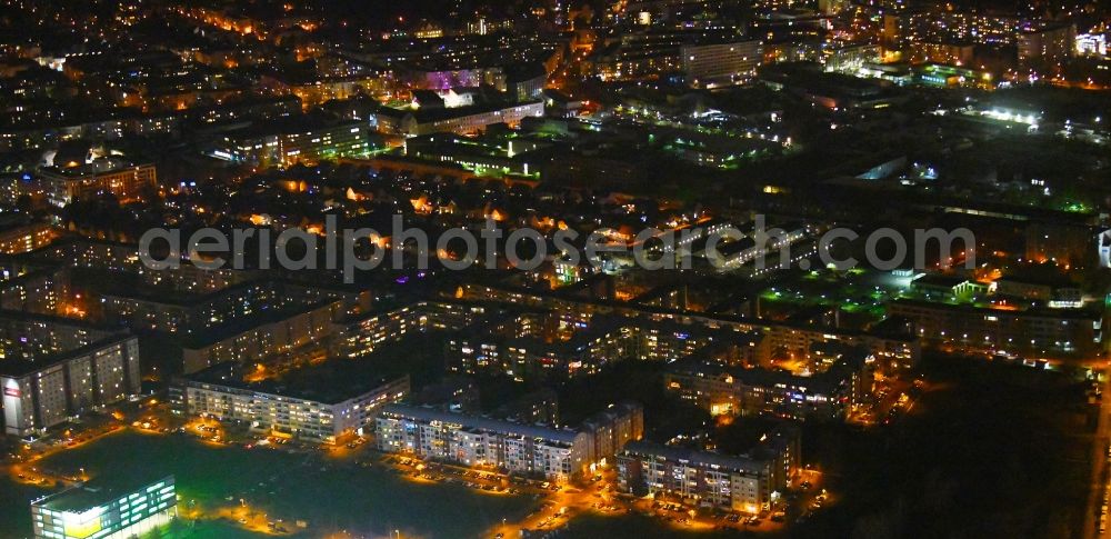 Berlin at night from above - Night lighting residential area of a multi-family house settlement Plauener Strasse - Sollstaedter Strasse - Arendsweg in the district Hohenschoenhausen in Berlin, Germany