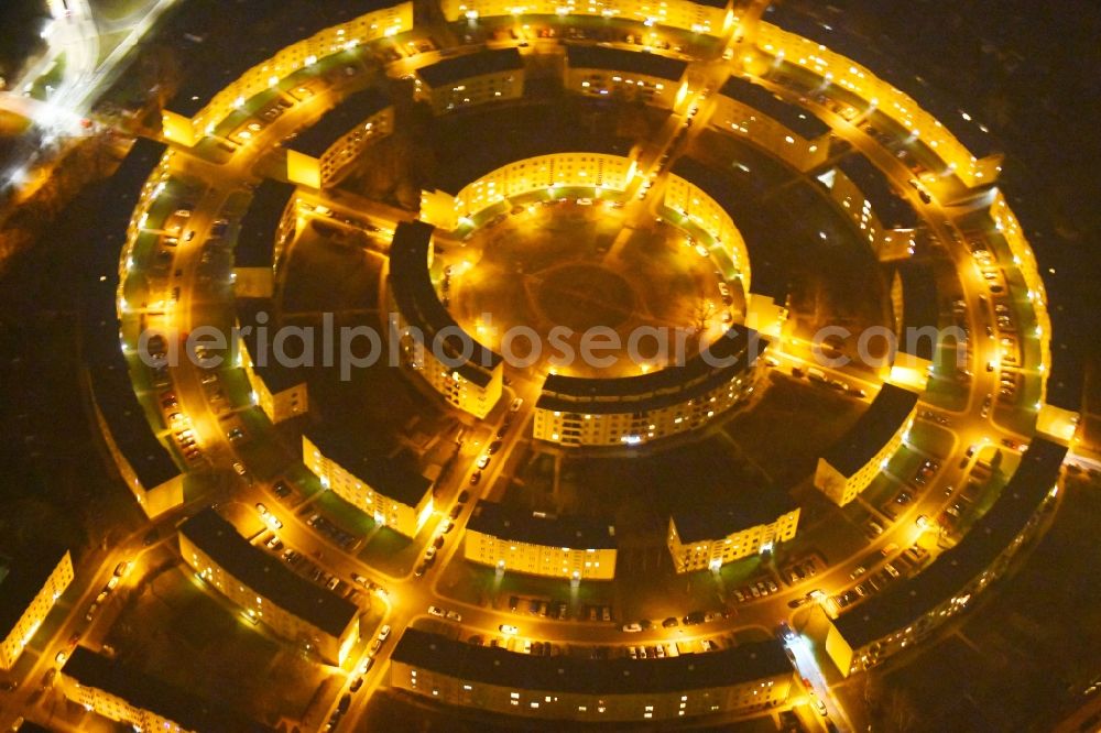 Leipzig at night from above - Night lighting Residential area a row house settlement Nibelungensiedlung - Rundling on Siegfriedplatz - Nibelungenring in the district Loessnig in Leipzig in the state Saxony, Germany