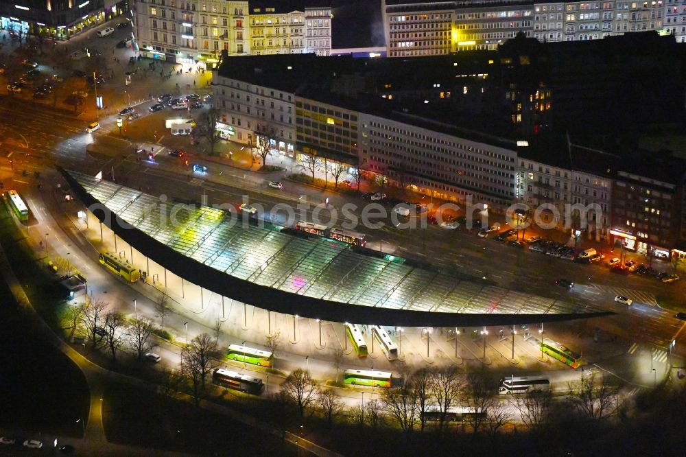 Aerial image at night Hamburg - Night lighting central Bus Station for Public Transportation on Carl-Legien-Platz - Adenauerallee in Hamburg, Germany