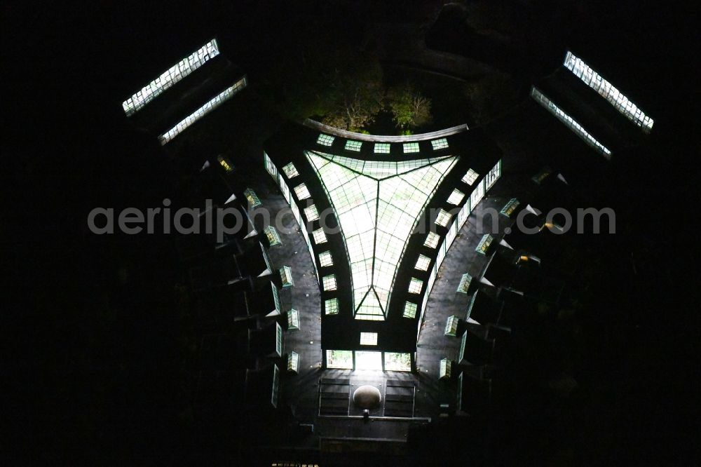 Aerial photograph at night Berlin - Night lighting zoo grounds at the Alfred Brehm House in Tierpark in the district of Friedrichsfelde in Berlin, Germany