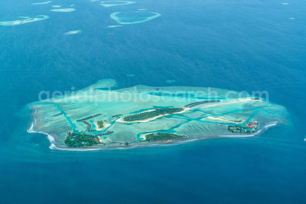 Gulhi from the bird's eye view: Atoll on the water surface Anantara Resort in Gulhi in Kaafu Atoll, Maldives