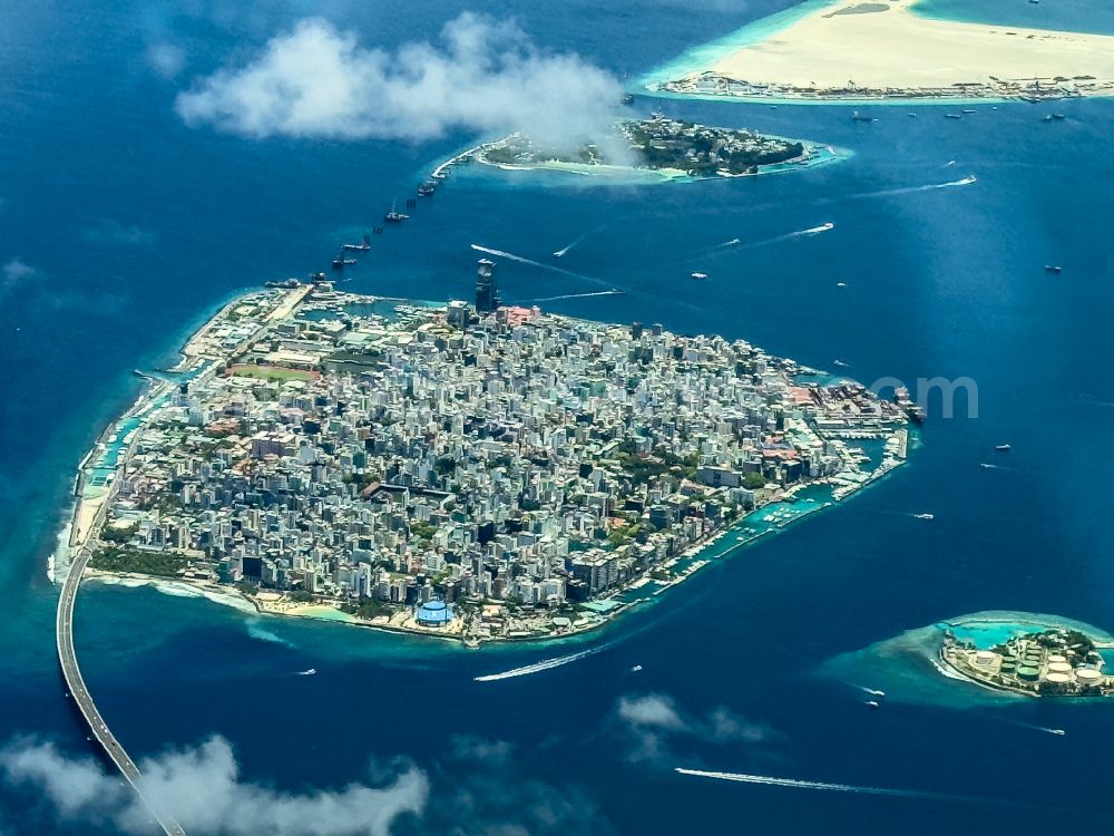 Aerial image Male - Atoll on the water surface Male on street Majeedhee Magu Road in Male in Maldives