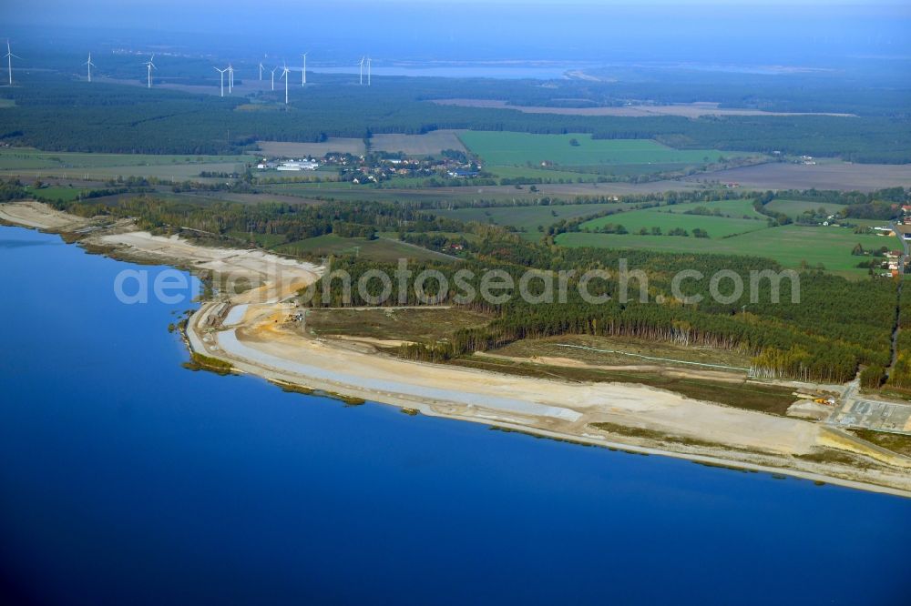 Bahnsdorf from the bird's eye view: Expansion and fortification of the shore areas of the lake Sedlitzer See in Bahnsdorf in the state Brandenburg, Germany