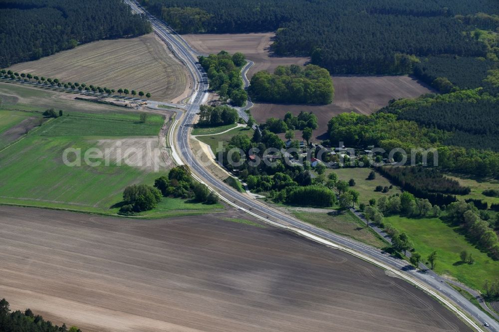 Schmerzke from the bird's eye view: Construction of the bypass road in in Schmerzke in the state Brandenburg, Germany