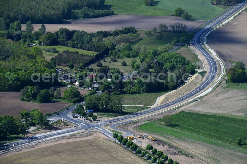 Schmerzke from the bird's eye view: Construction of the bypass road in in Schmerzke in the state Brandenburg, Germany