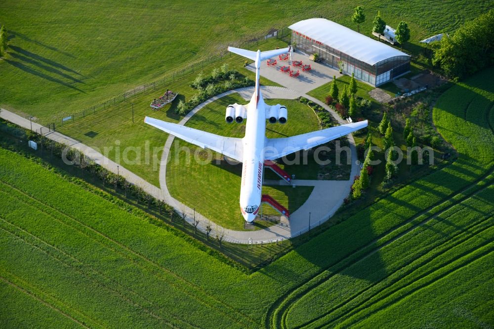 Aerial image Stölln - Discharged passenger aircraft IL-62 of the GDR - airline INTERFLUG Lady Agnes on a parking area in Stoelln in the federal state Brandenburg, Germany