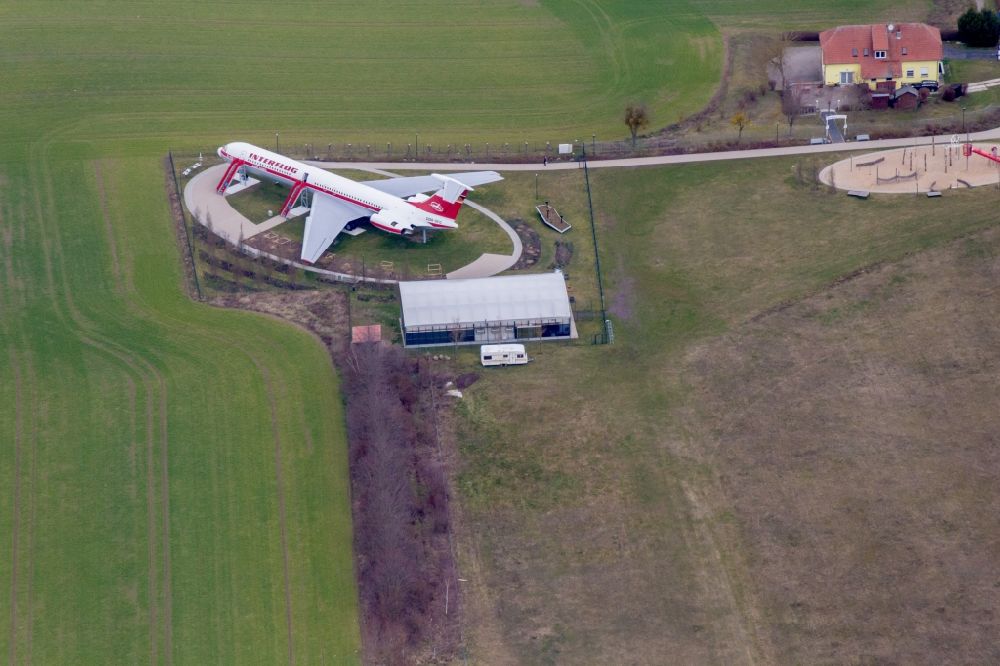 Gollenberg from above - Discharged passenger aircraft IL-62 of the GDR - airline INTERFLUG Lady Agnes on a parking area in Stoelln in the federal state Brandenburg, Germany