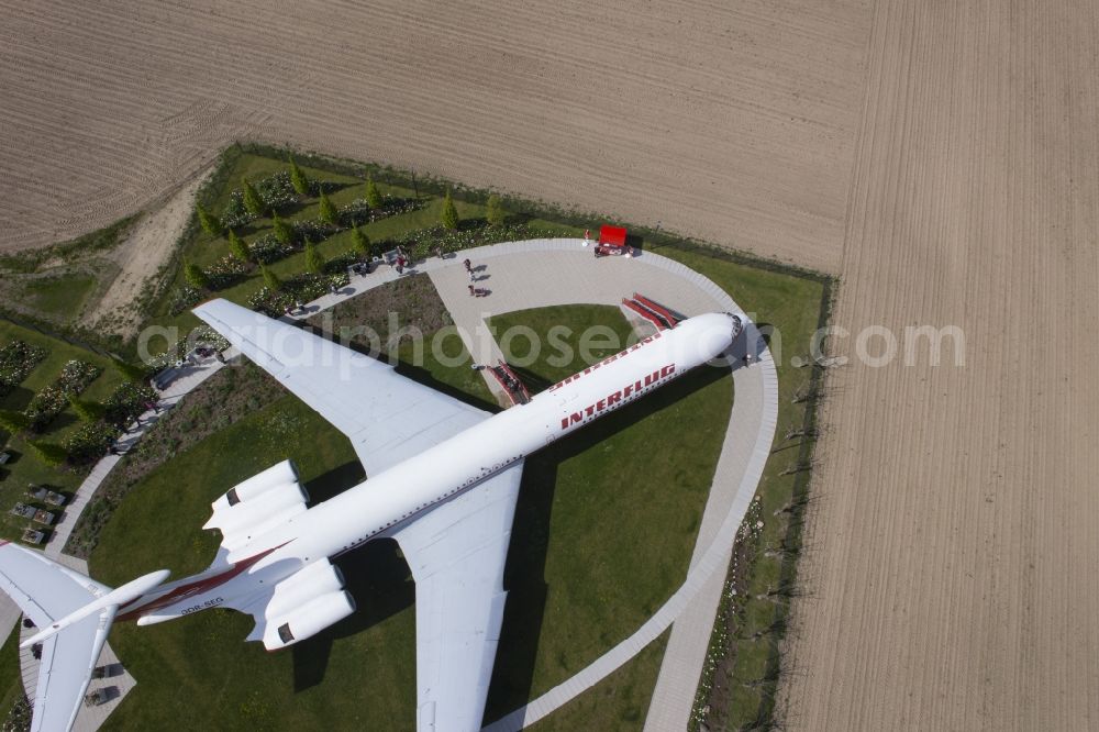Aerial photograph Gollenberg - Discharged passenger aircraft IL-62 of the GDR - airline INTERFLUG Lady Agnes on a parking area in Stoelln in the federal state Brandenburg, Germany
