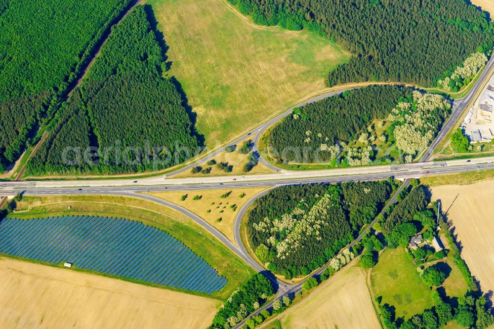 Heiligengrabe from the bird's eye view: Routing and traffic lanes during the highway exit and access the motorway A 24 Anschlussstelle Pritzwalk in Heiligengrabe in the state Brandenburg, Germany