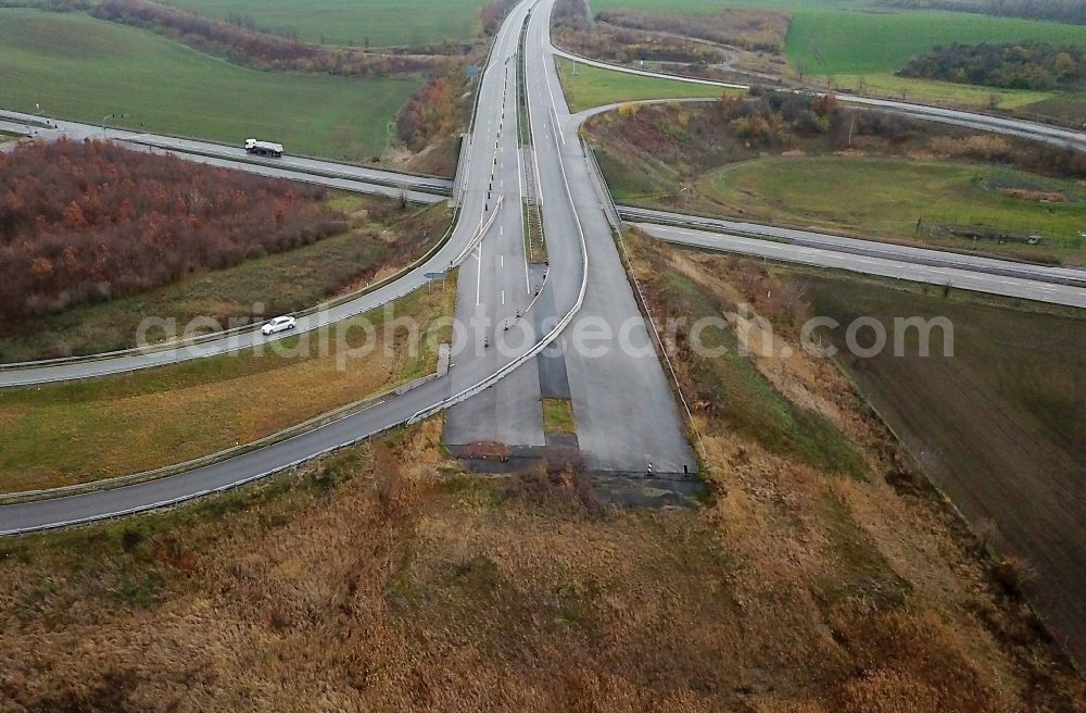 Aerial image Bennstedt - Routing and traffic lanes during the highway exit and access the motorway A 143 to the B80 in Bennstedt in the state Saxony-Anhalt, Germany