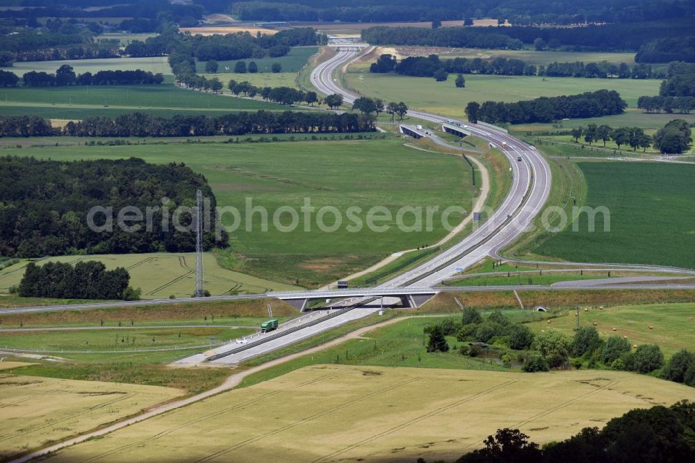 Karstädt from above - Routing and traffic lanes during the highway exit and access the motorway A 14 to road L137 in Karstaedt in the state Brandenburg, Germany