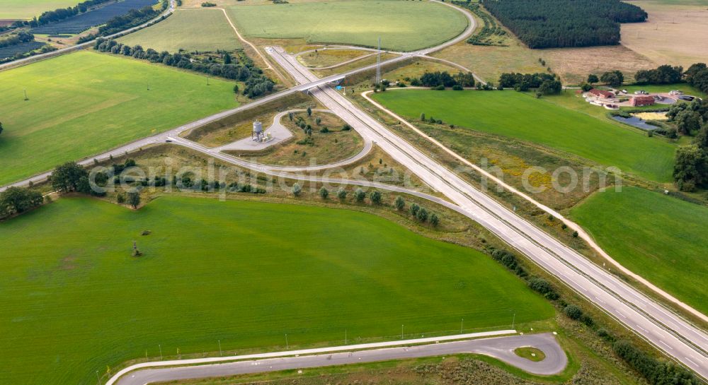 Aerial photograph Karstädt - Routing and traffic lanes during the highway exit and access the motorway A 14 to road L137 in Karstaedt in the state Brandenburg, Germany