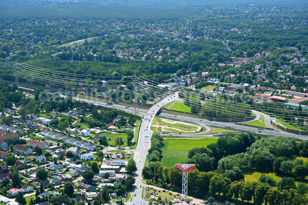 Birkenwerder from the bird's eye view: Route and lanes in the course of the exit and access of the motorway junction of the BAB A10 in the district Borgsdorf in Birkenwerder in the state Brandenburg, Germany