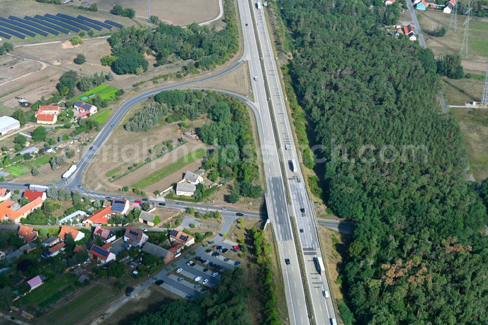 Aerial photograph Duben - Route and lanes in the course of the exit and access of the motorway junction of the BAB A13 in Duben in the state Brandenburg, Germany