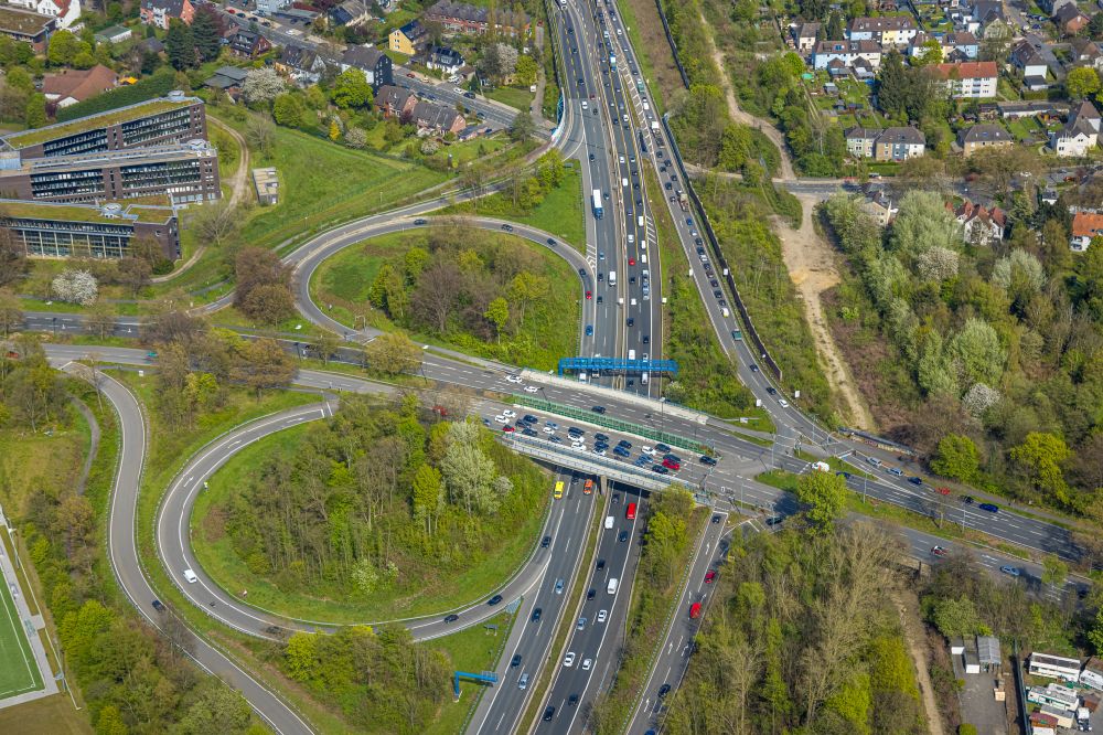 Bochum from above - Route and lanes in the course of the exit and access of the motorway junction of the BAB A448 on street Oviedo-Ring - Koenigsallee in the district Wiemelhausen in Bochum at Ruhrgebiet in the state North Rhine-Westphalia, Germany