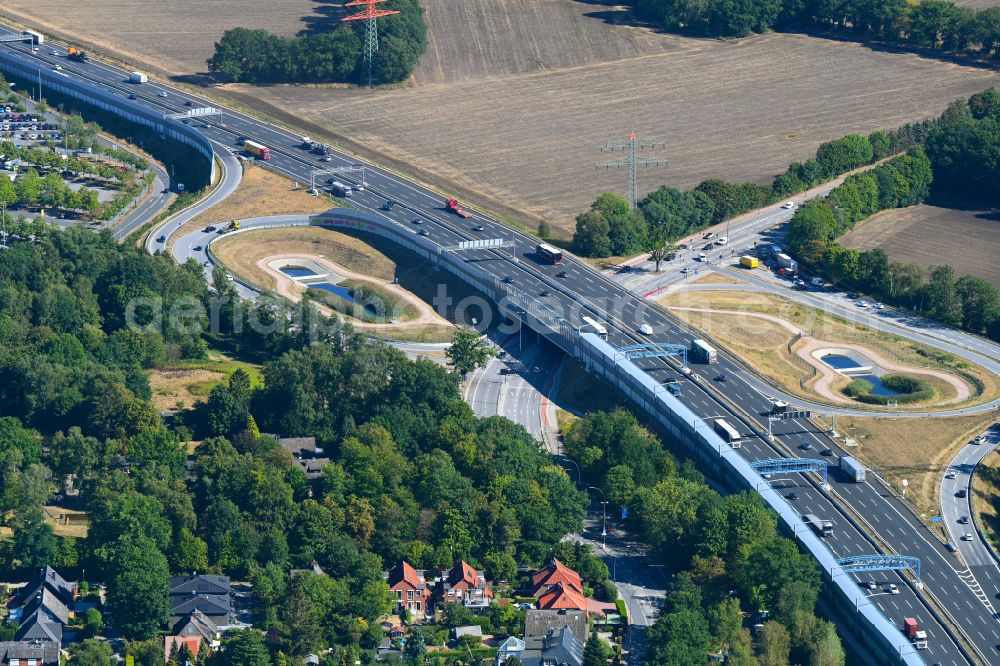 Hamburg from above - Route and lanes in the course of the exit and access of the motorway junction of the BAB A7 HH-Schnelsen-Nord in the district Schnelsen in Hamburg, Germany