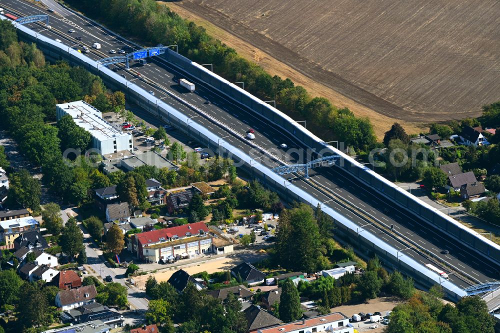 Hamburg from above - Route and lanes in the course of the exit and access of the motorway junction of the BAB A7 Schnelsen-Nord in the district Schnelsen in Hamburg, Germany