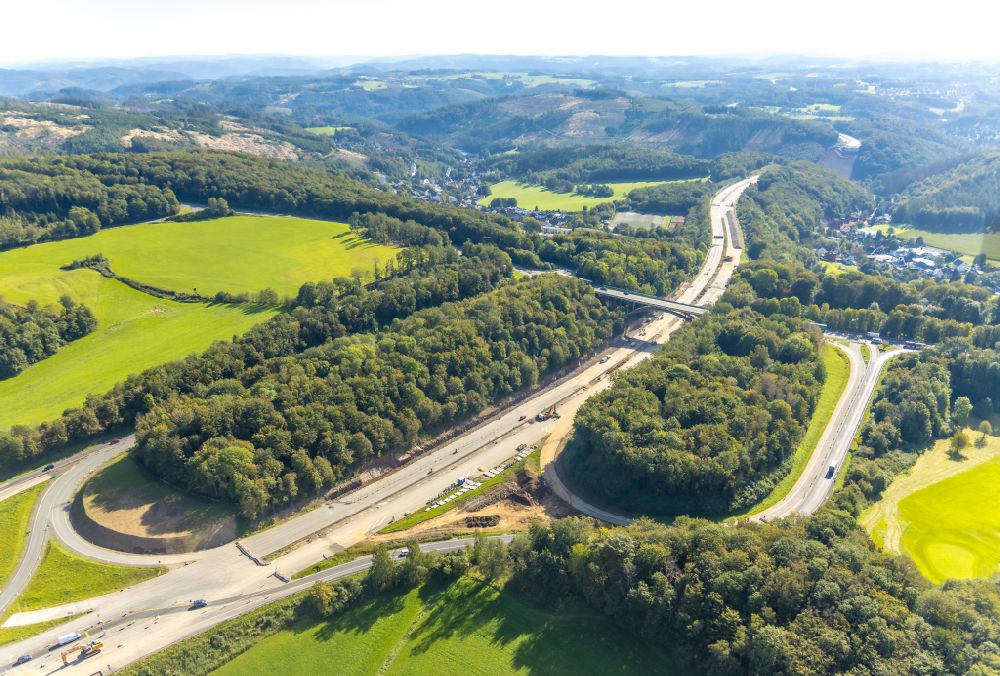 Aerial image Schnarüm - Route and lanes in the course of the exit and access of the motorway junction of the BAB A45 with Sperrung and Baustelle in Schnaruem in the state North Rhine-Westphalia, Germany