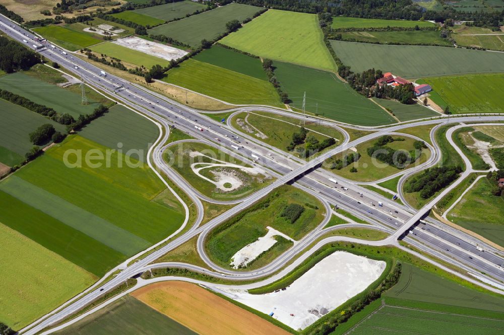Unterföhring from above - Route and lanes in the course of the exit and access of the motorway junction of the BAB A99 in Unterfoehring in the state Bavaria, Germany