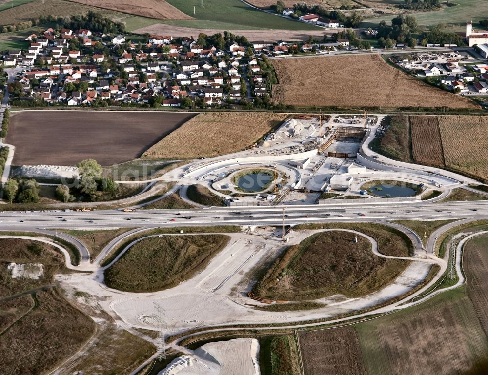 Essenbach from the bird's eye view: The construction site of junction A92 and federal road B15 new with the groundwater sump Ohu in Essenbach in the district of Landshut in the federal state of Bavaria, Germany. The federal highway B 15 new under the motorway A92 Munich - Deggendorf. Responsible for the construction site is the Autobahndirektion Suedbayern