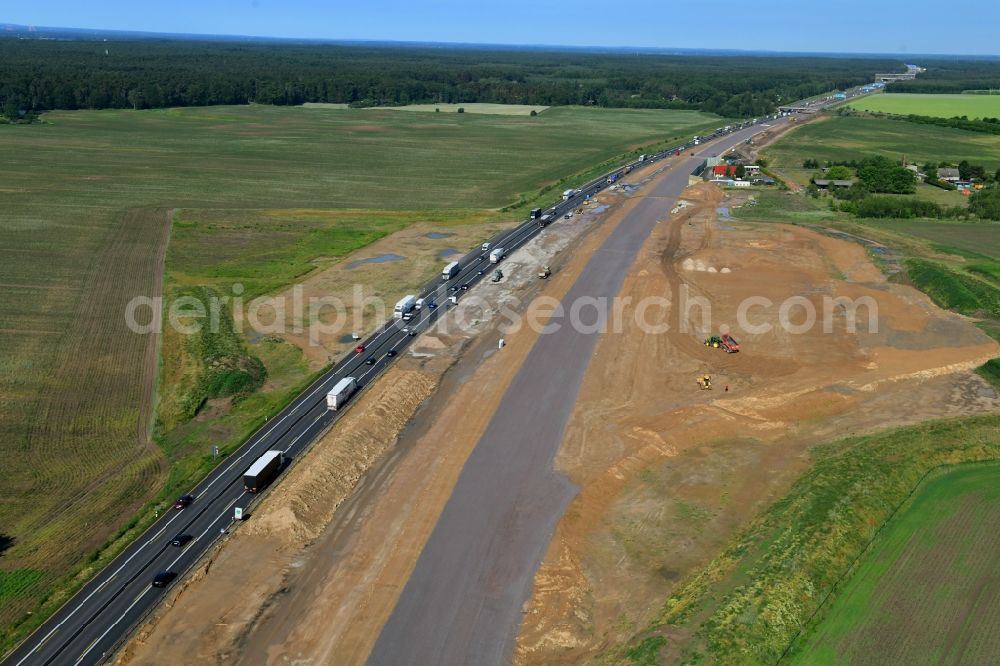 Oberkrämer from the bird's eye view: Highway construction site for the expansion and extension of track along the route of A10 in Oberkraemer in the state Brandenburg, Germany