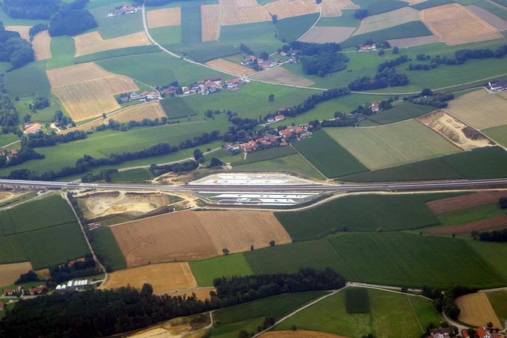 Aerial image Dorfen - Highway- construction site with earthworks along the route of the highway and motorway A94 with the truck parking space at Unterstollnkirchen in Dorfen in the state Bavaria, Germany