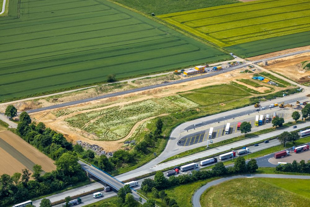 Aerial image Schlückingen - Motorway construction site with development, embankment and earthworks to expand the tank and rest area Am Haarstrang-Sued on the A44 in Schluckingen in the Ruhr area in the state of North Rhine-Westphalia, Germany