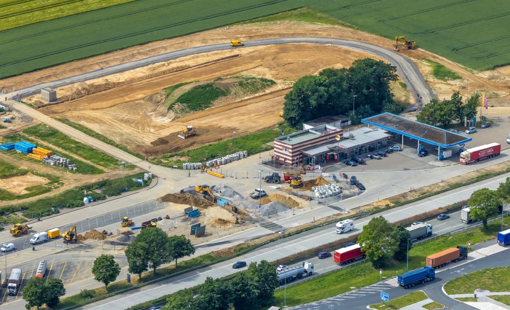 Schlückingen from above - Motorway construction site with development, embankment and earthworks to expand the tank and rest area Am Haarstrang-Sued on the A44 in Schluckingen in the Ruhr area in the state of North Rhine-Westphalia, Germany