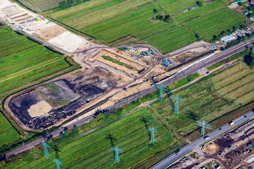 Hamburg from the bird's eye view: Motorway- Construction site with earthworks along the route and of the route of the highway Anschussstelle A26 A7 in Hamburg, Germany