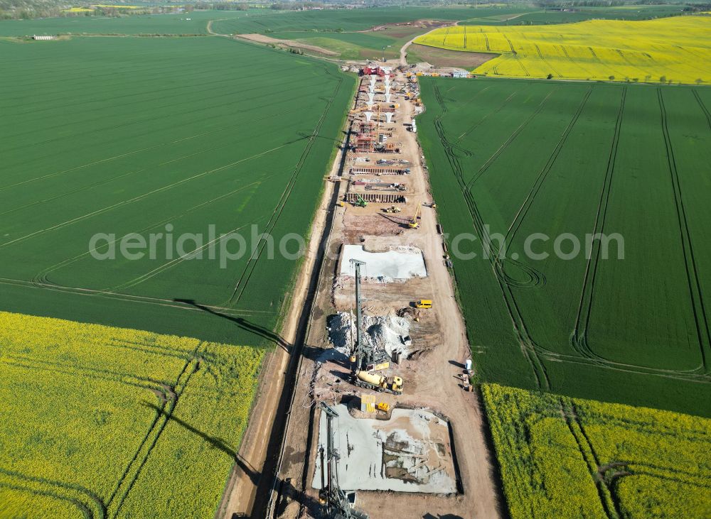 Salzmünde from the bird's eye view: Motorway- Construction site with earthworks along the route and of the route of the highway of BAB Autobahn A143 on street Lettiner Strasse in Salzmuende Salzatal in the state Saxony-Anhalt, Germany