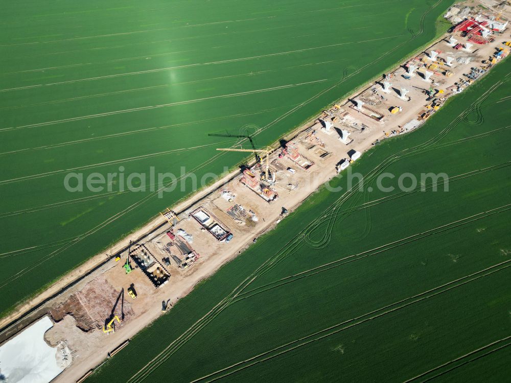 Aerial image Salzmünde - Motorway- Construction site with earthworks along the route and of the route of the highway of BAB Autobahn A143 on street Lettiner Strasse in Salzmuende Salzatal in the state Saxony-Anhalt, Germany