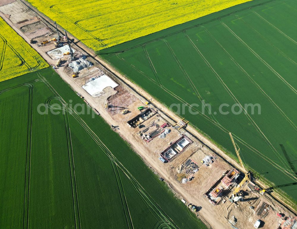 Aerial photograph Salzmünde - Motorway- Construction site with earthworks along the route and of the route of the highway of BAB Autobahn A143 on street Lettiner Strasse in Salzmuende Salzatal in the state Saxony-Anhalt, Germany