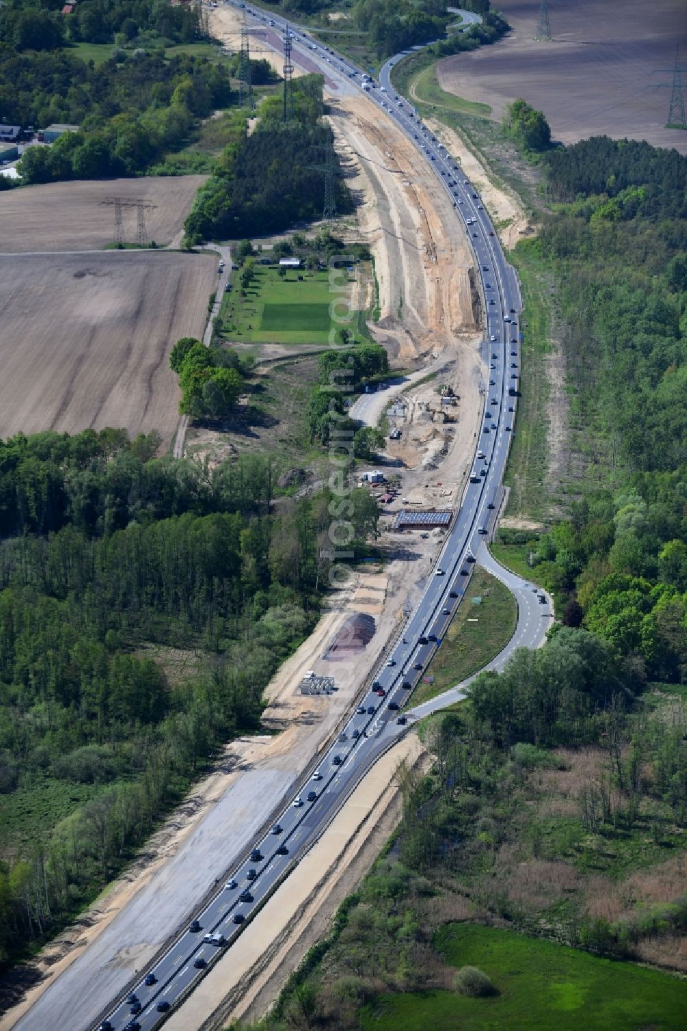 Mühlenbecker Land from the bird's eye view: Highway- Construction site with earthworks along the route and of the route of the highway of BAB 10 in Muehlenbecker Land in the state Brandenburg, Germany