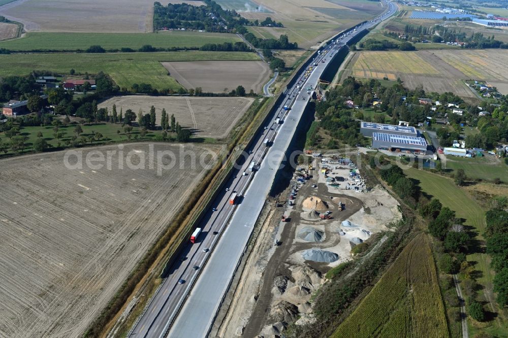 Oberkrämer from above - Highway- Construction site with earthworks along the route and of the route of the highway of BAB A10 in the district Baerenklau in Oberkraemer in the state Brandenburg, Germany