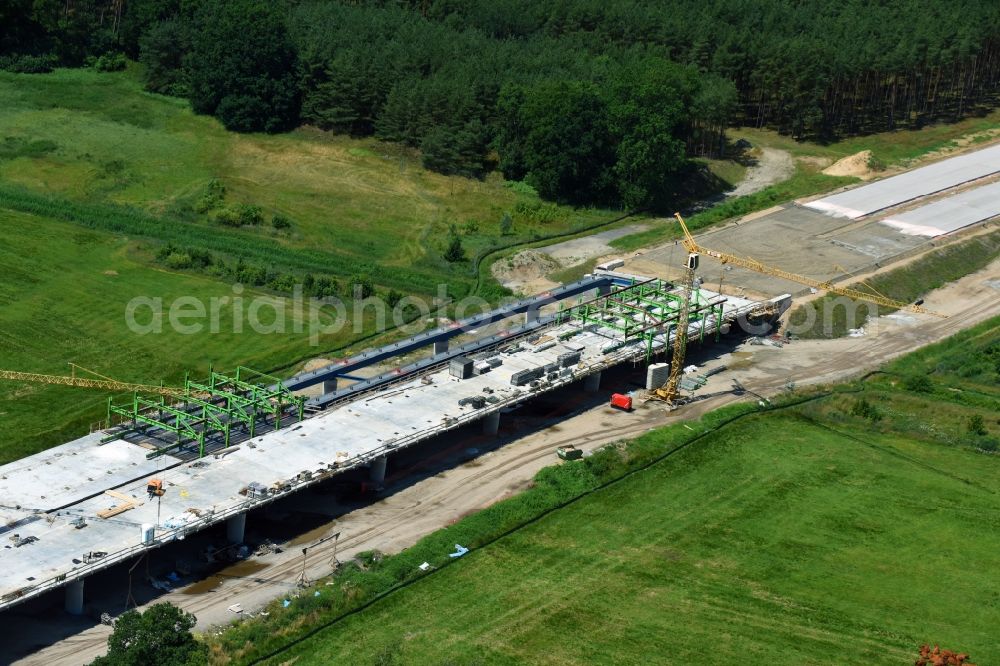 Grabow from the bird's eye view: Highway- Construction site with earthworks along the route and of the route of the highway bridge Eldebruecke on federal- motorway BAB A14 in Fresenbruegge in the state Mecklenburg - Western Pomerania