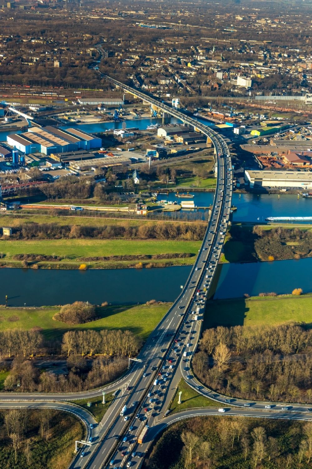 Duisburg from above - Routing and traffic lanes over the highway bridge in the motorway A 59 over the Rhine river course in Duisburg in the state North Rhine-Westphalia, Germany
