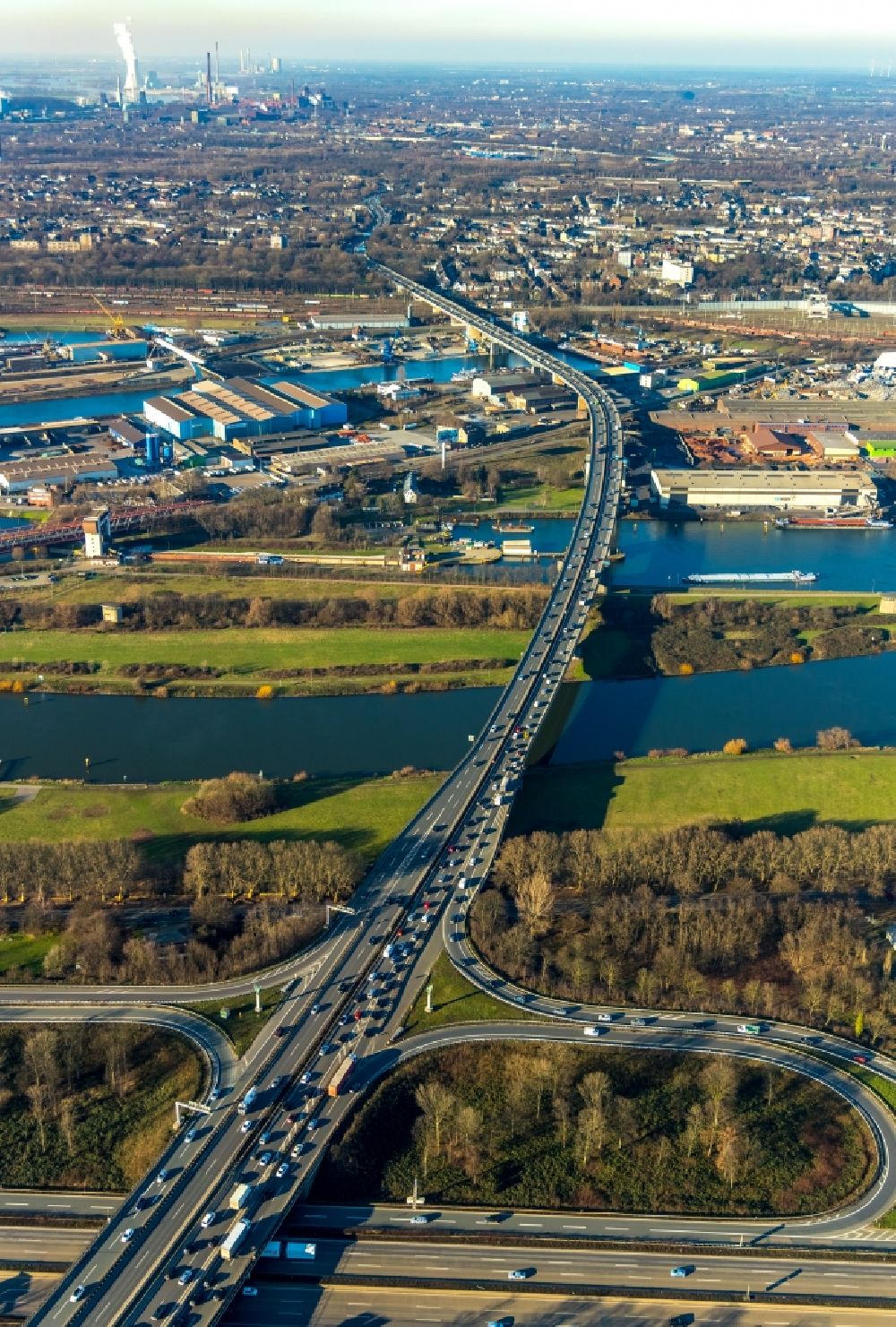 Aerial photograph Duisburg - Routing and traffic lanes over the highway bridge in the motorway A 59 over the Rhine river course in Duisburg in the state North Rhine-Westphalia, Germany